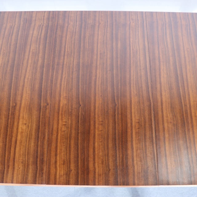 Rectangular vintage teak dining table top with fine wood grain, mid-century British and Danish design influence.