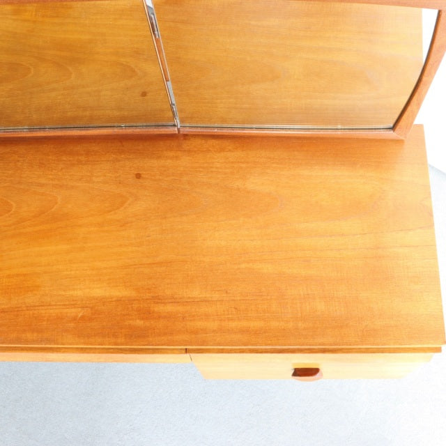 Vintage teak mid-century British dresser top with smooth wood grain and rounded edges, part of Durable Suites collection.