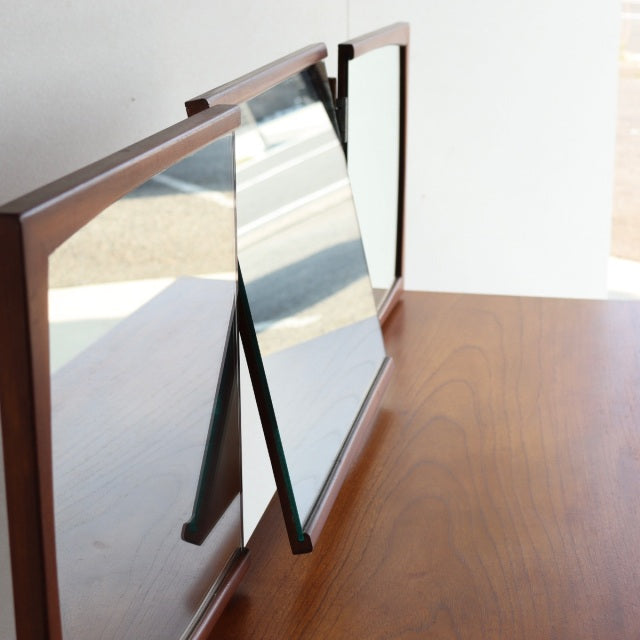 Vintage teak mid-century British Durable Suites dresser with smooth wood grain and three adjustable mirrors.