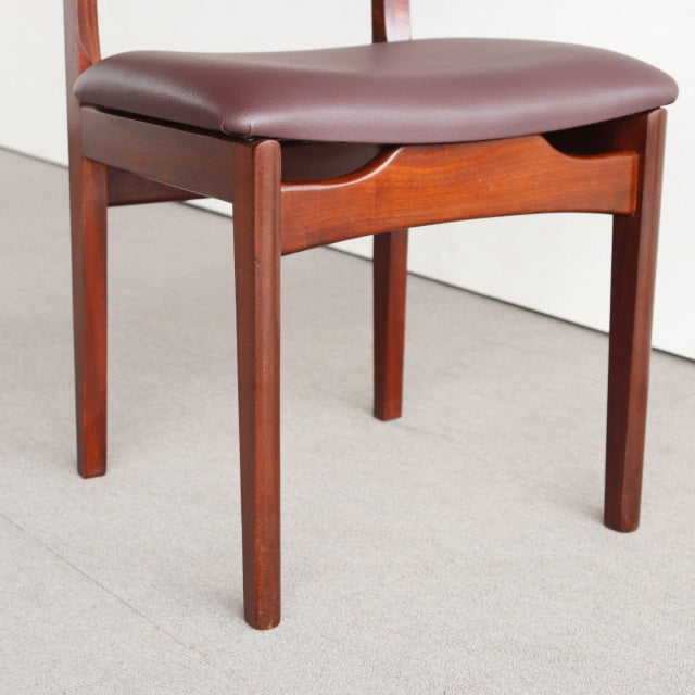 Vintage British mid-century teak dining chair with smooth wood grain and brown cushioned seat from Younger.