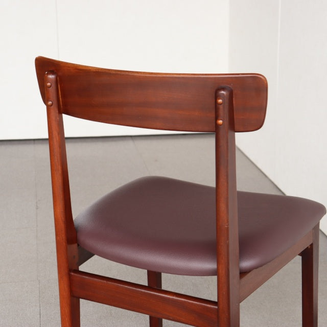 Vintage teak dining chair by YOUNGER with British mid-century design, curved backrest, and smooth leather seat in rich brown.