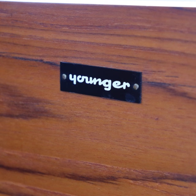 Vintage teak wood sideboard plaque with "Younger" brand label, mid-century British design.