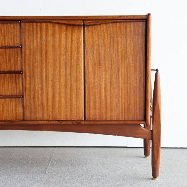Vintage teak sideboard by Elliotts of Newbury in British mid-century style with rich wood grain and tapered legs.