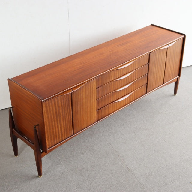 Vintage teak sideboard by Elliotts of Newbury, British mid-century design with sleek contoured drawer fronts and vertical.