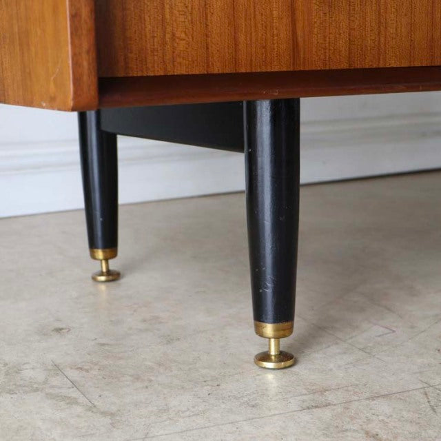Mid-century vintage teak desk legs with black tapered wood and brass adjustable feet, British G-PLAN design.