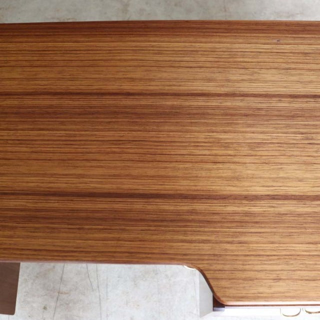 Vintage teak G-Plan desk top showing fine wood grain with smooth mid-century British design.