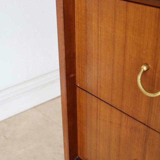 Vintage British mid-century teak desk from G-PLAN with visible wood grain and brass handle detail.