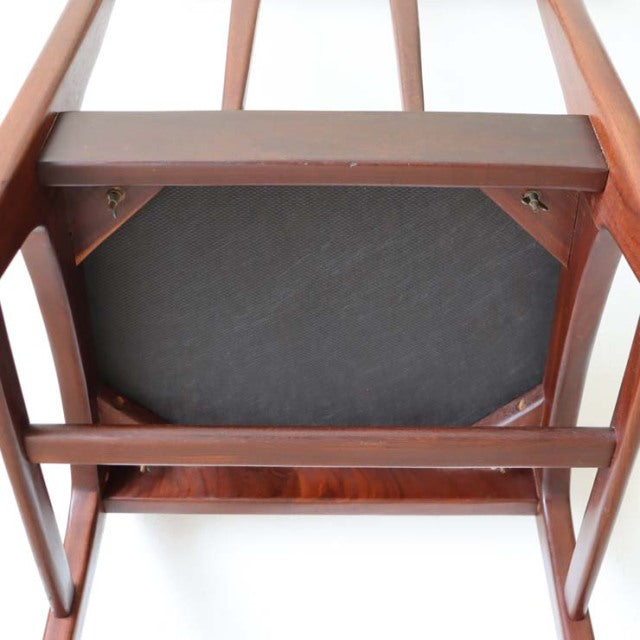 Underside view of mid-century British vintage teak dining chair by A.Younger Ltd, showing wood grain and sturdy frame.