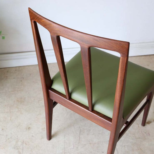 Vintage mid-century teak dining chair by A.Younger Ltd., British design with sleek tapered legs and green upholstered seat,.