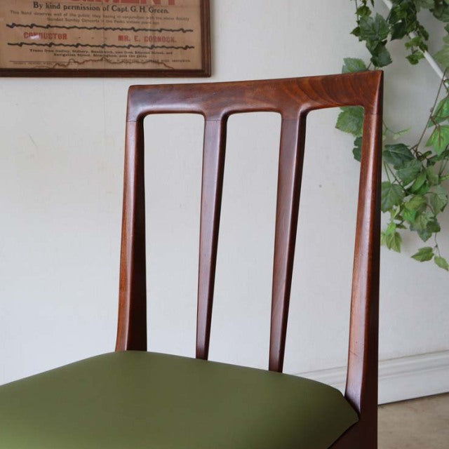 Vintage teak dining chair by A.Younger Ltd., British mid-century design with slender vertical slats and olive green seat.