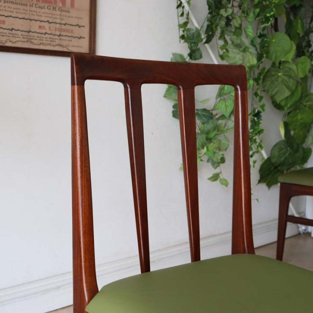 Vintage teak dining chair by A.Younger Ltd., mid-century British design with sleek vertical slats and olive green.