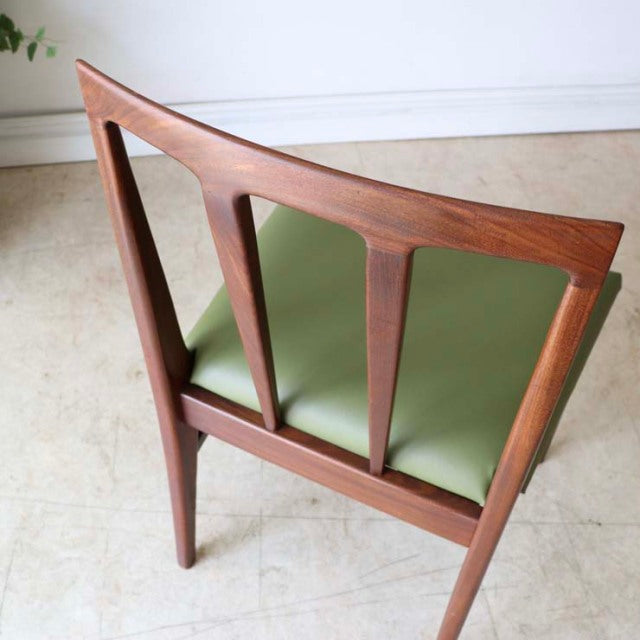 Vintage mid-century British teak dining chair by A.Younger Ltd., featuring angled backrest with three vertical slats and.