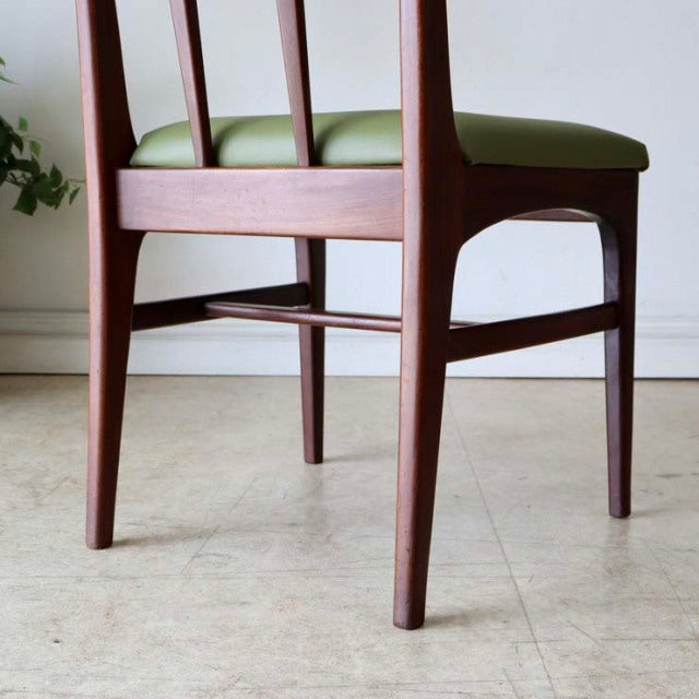 Vintage teak dining chair by A.Younger Ltd., British mid-century design with slender legs and smooth wood grain, green.