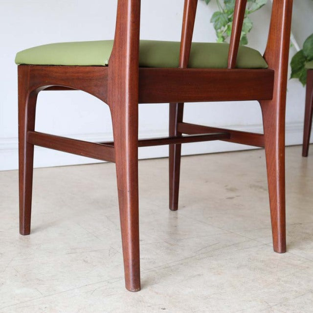 Vintage teak dining chair by A.Younger Ltd, British mid-century design with slender tapered legs and visible wood grain,.