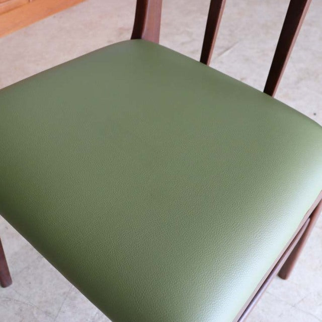 Set of four vintage mid-century Danish teak dining chairs by A.Younger Ltd., green vinyl seat cushions, slender wooden legs, .