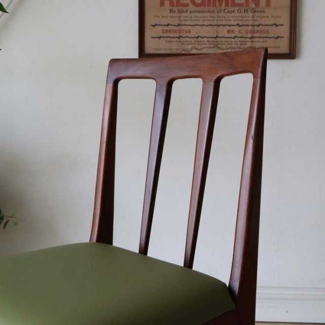 Mid-century British vintage teak dining chair by A.Younger Ltd., slender vertical slats and olive green cushioned seat.