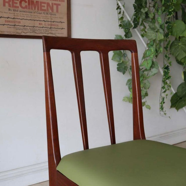Mid-century British vintage teak dining chair by A.Younger Ltd., slender vertical slats and olive green seat cushion.