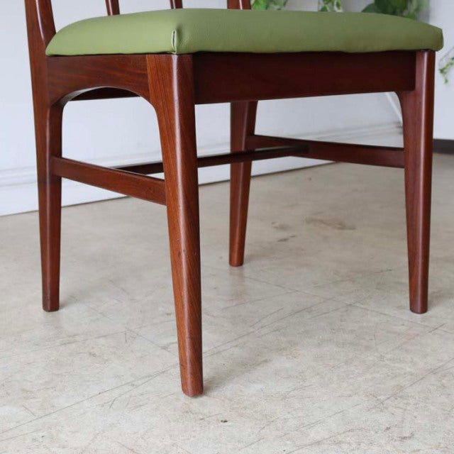 Mid-century British teak dining chair by A.Younger Ltd., sleek legs with visible wood grain and green upholstered seat.