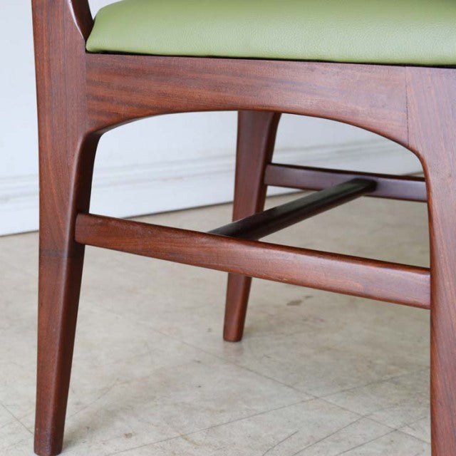Vintage British mid-century teak dining chair leg and stretcher details with smooth wood grain and tapered square legs.