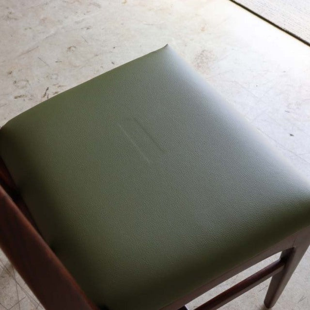 Vintage teak dining chair seat cushion in olive green with mid-century British design by John Herbert Fonseca.
