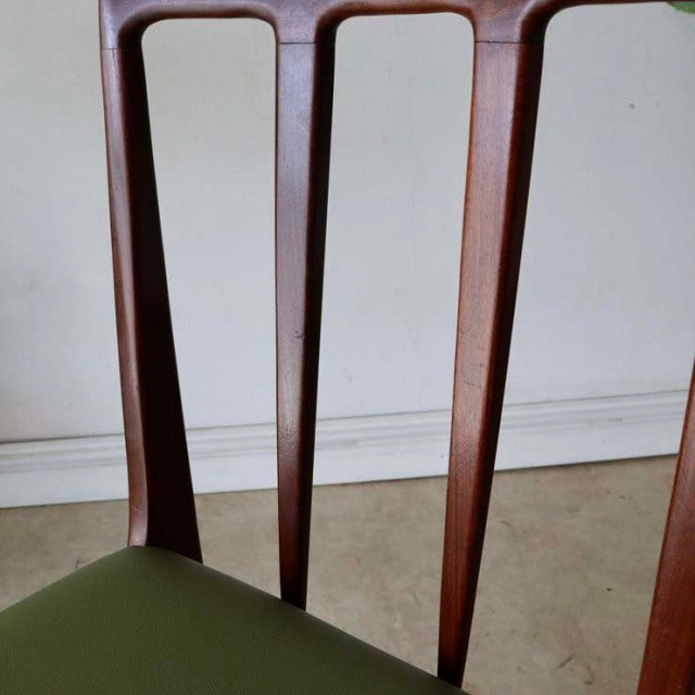 Vintage mid-century teak dining chair by A.Younger Ltd., British design with slender vertical backrest slats and olive green .