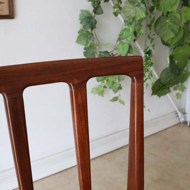 Vintage teak dining chair by A.Younger Ltd., mid-century British design with smooth wood grain and slender legs, Danish.