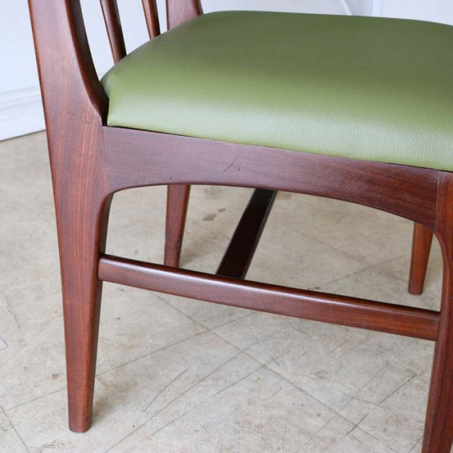 Vintage mid-century teak dining chair by A.Younger Ltd., British design with smooth wood grain and olive-green upholstered.