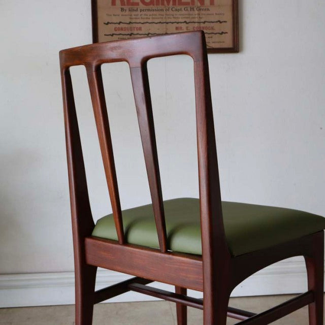 Vintage teak dining chair designed by John Herbert Fonseca, British mid-century with slender vertical back slats and olive.