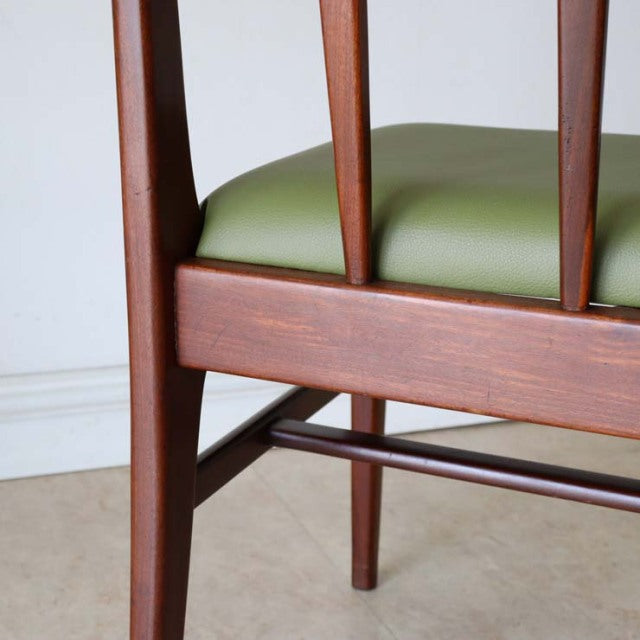 Mid-century British vintage teak dining chair by A.Younger Ltd., smooth wood grain, olive green upholstered seat, slender.