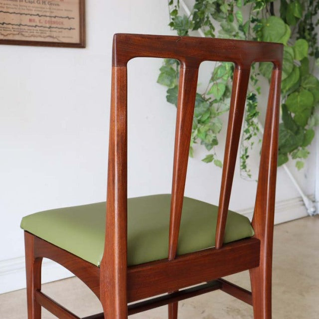 Vintage teak dining chair by A.Younger Ltd. with mid-century British-Denmark design, olive green seat, slender vertical back .