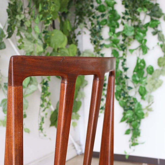 Vintage teak mid-century dining chair by A.Younger Ltd., British design with slender angled legs and smooth wood grain.