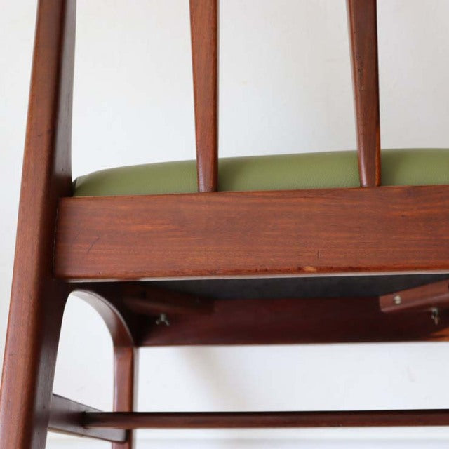 Mid-century British vintage teak dining chair with olive green upholstered seat and slender tapered legs, designed by John.