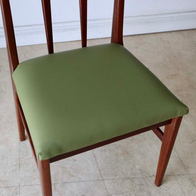 Vintage teak dining chair by A.Younger Ltd., mid-century British design with green upholstered seat and slender tapered legs.