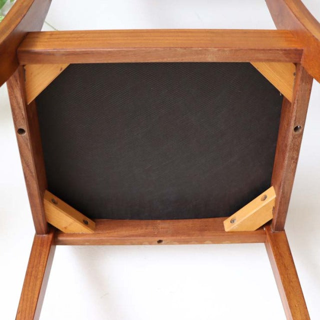Underside view of vintage teak G-Plan ladder back dining chair with sturdy angled wooden braces and mid-century British.