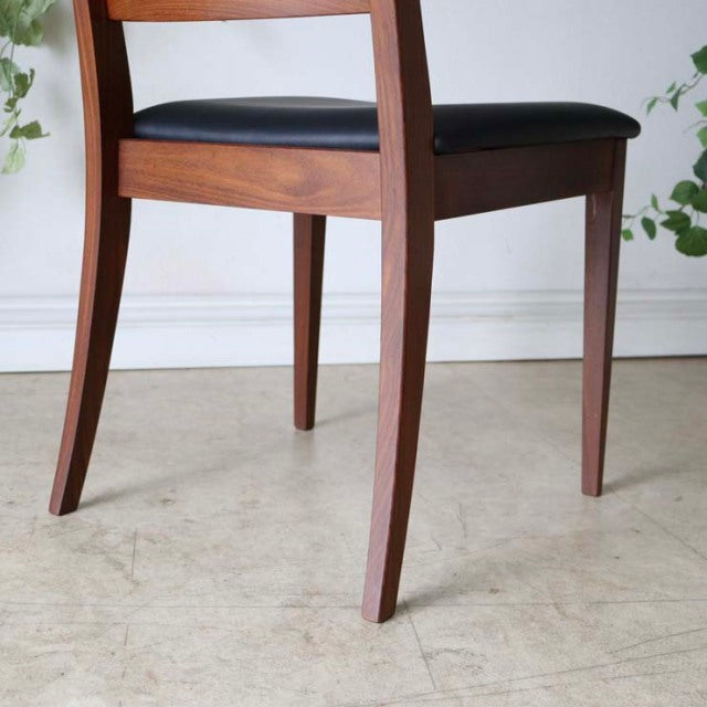 Set of four G-Plan vintage teak ladder back dining chairs with black leather seats, mid-century British design, elegant wood .