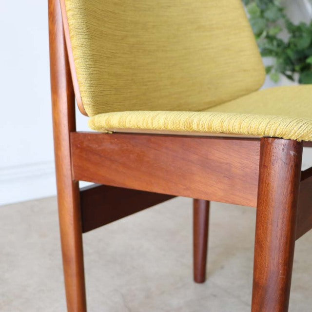 Vintage mid-century teak dining chair by Elliotts of Newbury with mustard fabric seat and tapered legs.