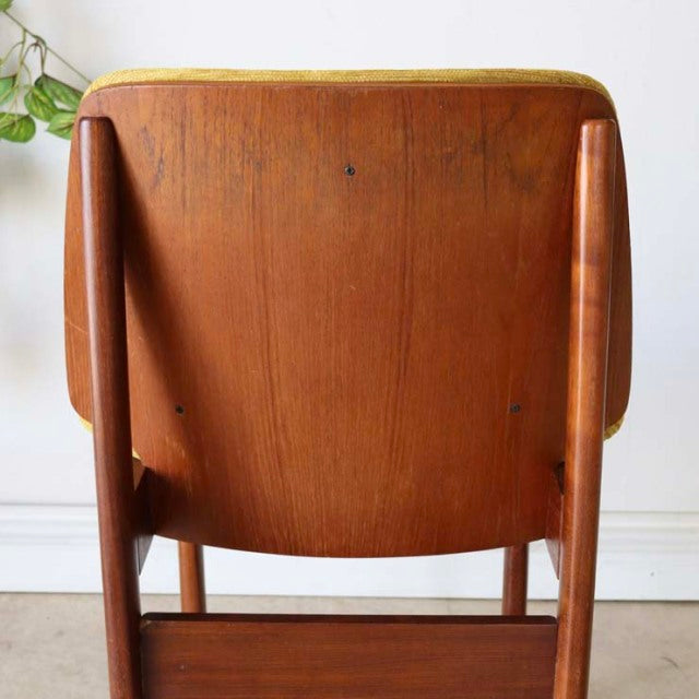 Vintage teak dining chair by Elliotts of Newbury, British mid-century design with warm wood grain and tapered legs from.