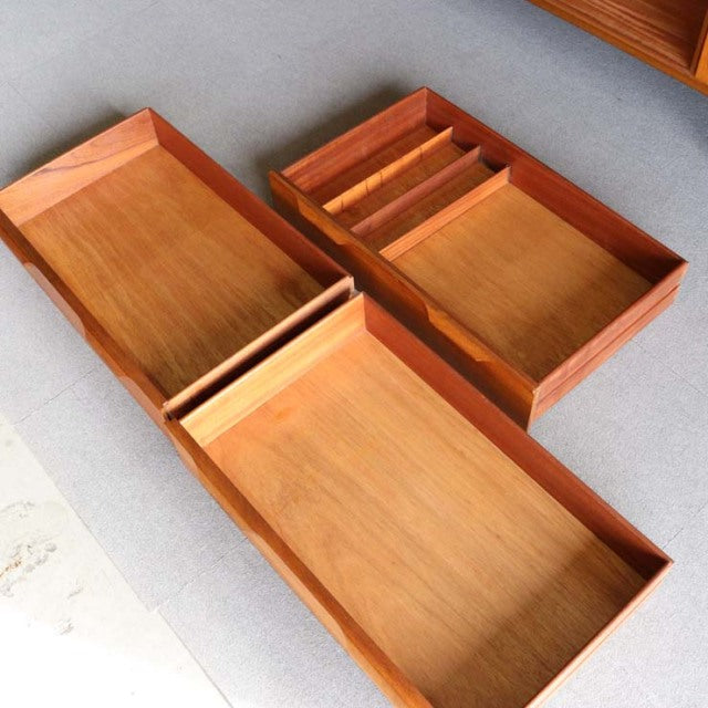 Vintage teak sideboard drawers from Austinsuite with smooth wood grain and mid-century British-Denmark design.