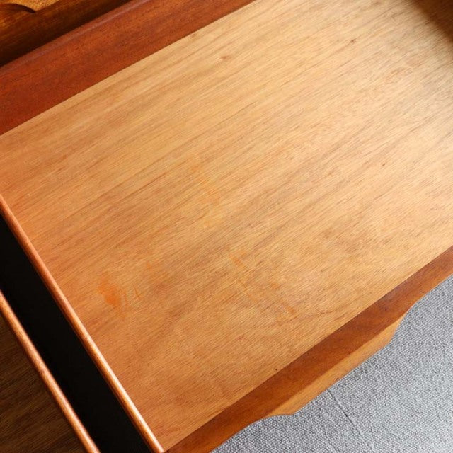 Vintage teak sideboard top surface showing smooth wood grain and warm mid-century British design from Austinsuite Denmark.