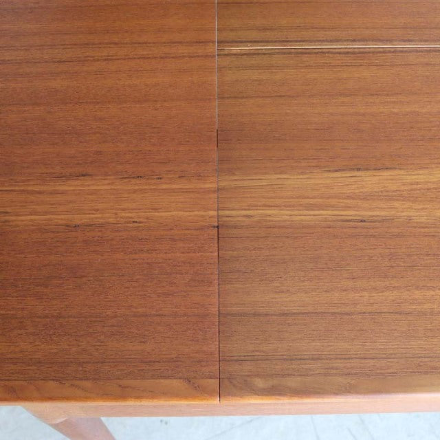Mid-century vintage teak dining table top with rich wood grain and seamless rectangular join from Denmark.