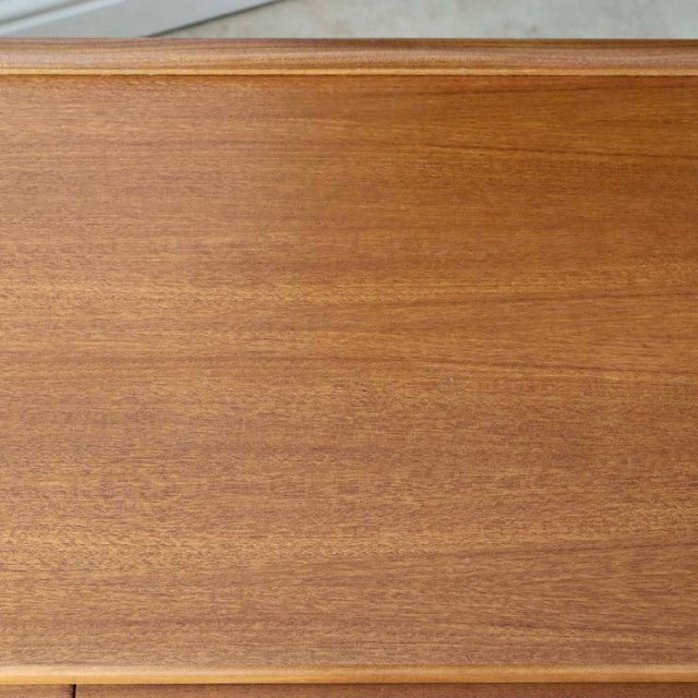 Vintage teak sideboard top with smooth wood grain and mid-century British design by McIntosh Denmark.