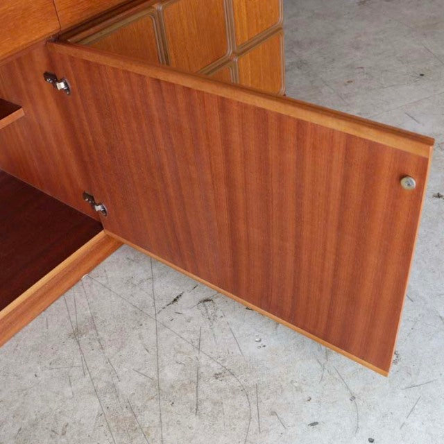 Mid-century vintage teak sideboard door with fine wood grain and subtle brass hinge by British McIntosh, Denmark style.