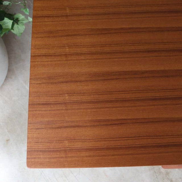 Mid-century vintage teak dining table top with fine wood grain from British Denmark design.