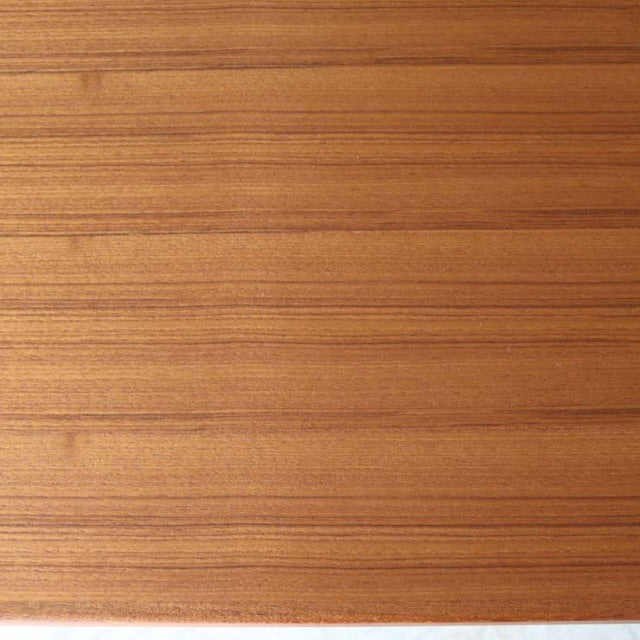 Vintage mid-century teak dining table top with rich wood grain from British-Denmark design.