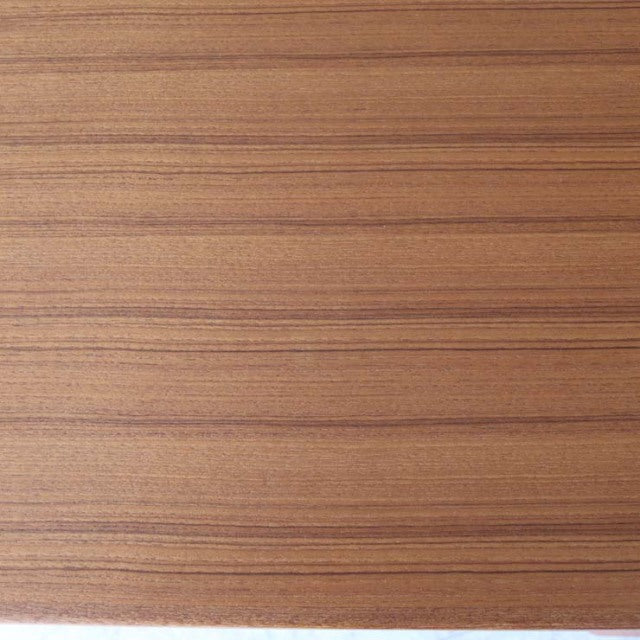 Vintage teak dining table top with fine wood grain, showcasing mid-century British and Danish design quality.