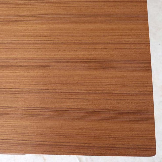 Vintage mid-century teak dining table top with fine wood grain from British Danish design, smooth rectangular surface.