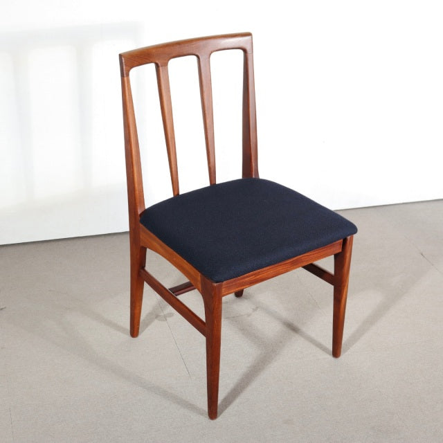 Vintage teak dining chair by YOUNGER with British mid-century design, navy upholstered seat, slender tapered legs, and.