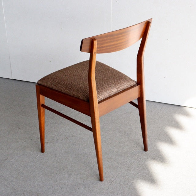 Vintage mid-century teak dining chair by McIntosh, British design with gently curved backrest and brown upholstered seat.