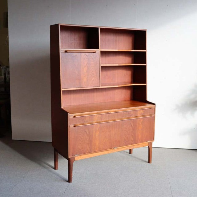Vintage mid-century teak cabinet by A.H. McIntosh, British design with clean lines, open shelves, and tapered legs.