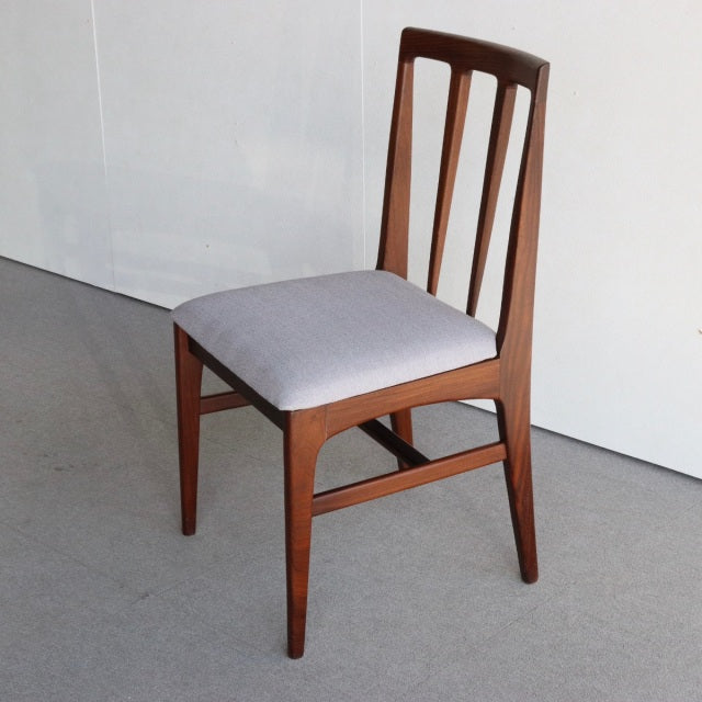 Vintage teak dining chair by Younger, British mid-century design with slatted back and gray upholstered seat, sleek tapered.
